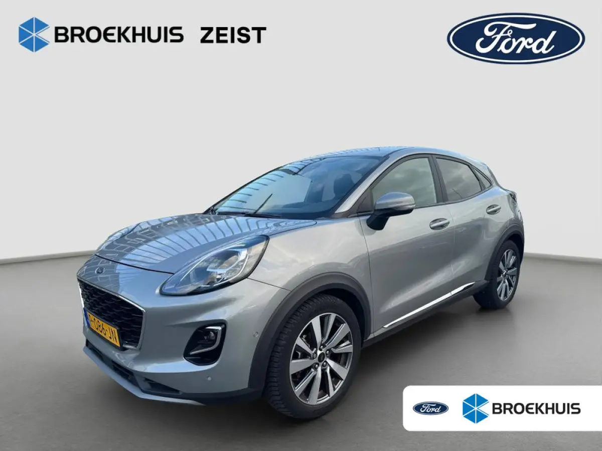 1.0 EcoBoost Titanium X | 100% dealer o.h. | Camera | Winter-pack | Trekhaak | Half leder | Apple carplay / andriod auto | B&O Audio | Privacy-glass