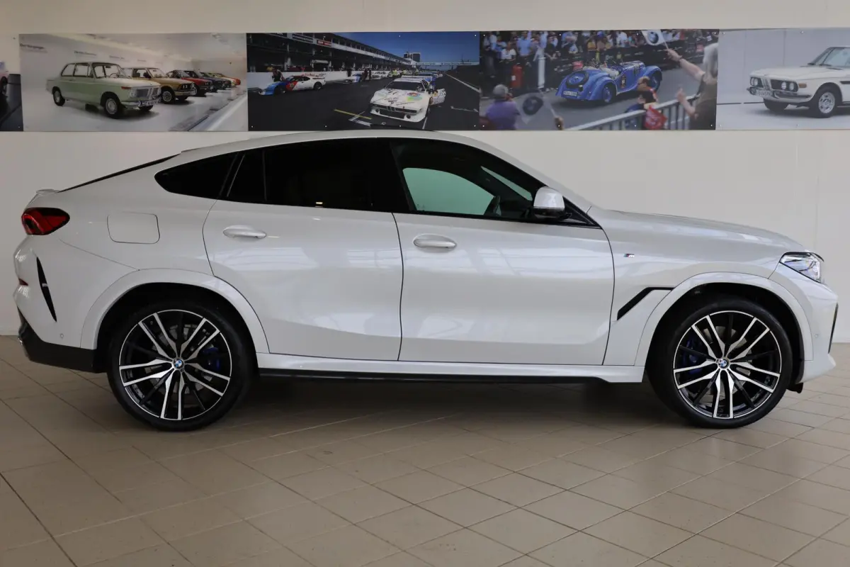 xDrive40i M Sportpakket | Soft-Close | Elek. trekhaak | Stoelventilatie | Driving Assistant Professional | Parking Assistant Plus
