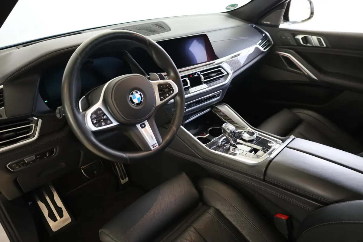 xDrive40i M Sportpakket | Soft-Close | Elek. trekhaak | Stoelventilatie | Driving Assistant Professional | Parking Assistant Plus