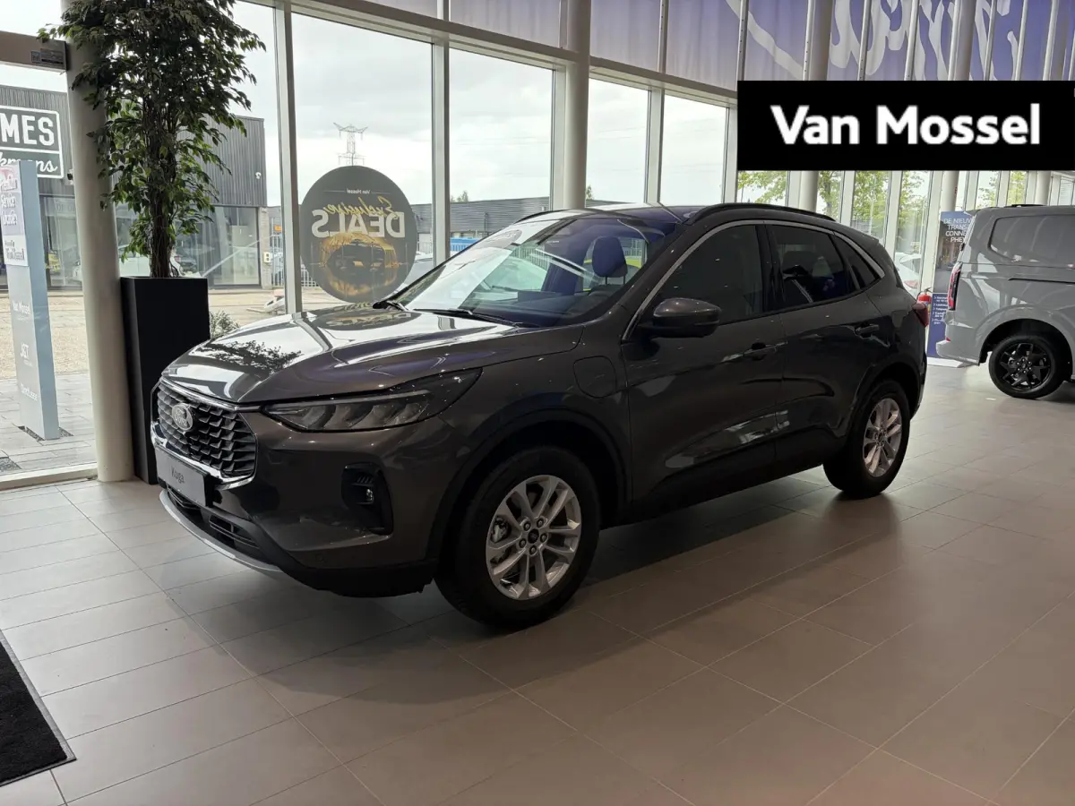 2.5 PHEV Titanium | WEGKLAPBARE TREKHAAK | VERWARMBARE VOORSTOELEN | VERWARMBAAR STUURWIEL | VERWARMBARE VOORRUIT | KEYLESS ENTRY | APPLE CAR PLAY | PARKEERSENSOREN | ACHTERUITRIJCAMERA | NA