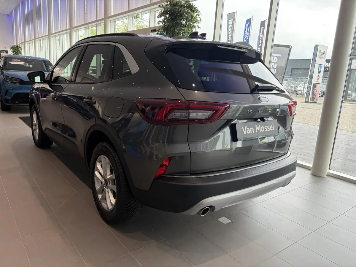 2.5 PHEV Titanium | WEGKLAPBARE TREKHAAK | VERWARMBARE VOORSTOELEN | VERWARMBAAR STUURWIEL | VERWARMBARE VOORRUIT | KEYLESS ENTRY | APPLE CAR PLAY | PARKEERSENSOREN | ACHTERUITRIJCAMERA | NA