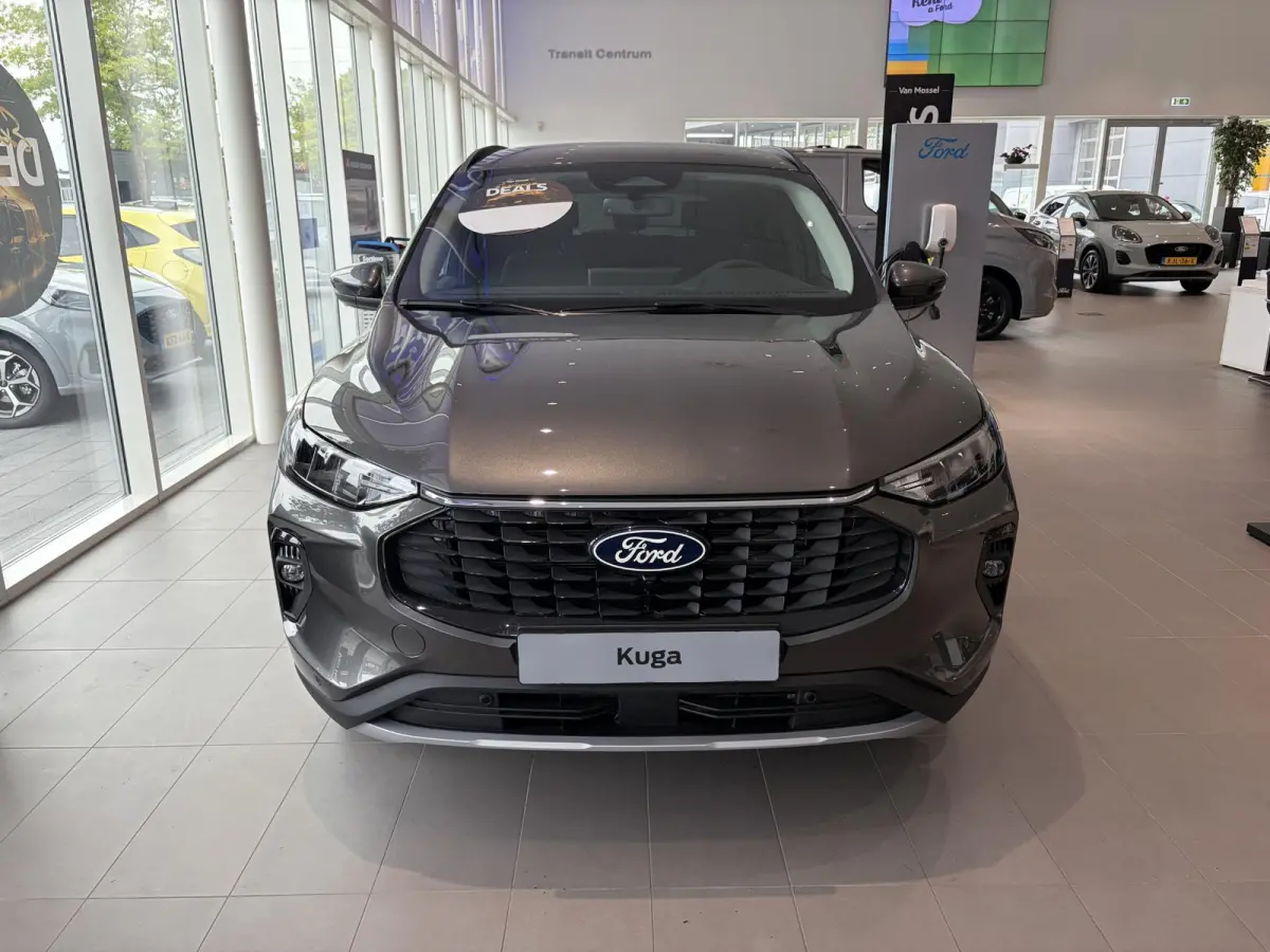 2.5 PHEV Titanium | WEGKLAPBARE TREKHAAK | VERWARMBARE VOORSTOELEN | VERWARMBAAR STUURWIEL | VERWARMBARE VOORRUIT | KEYLESS ENTRY | APPLE CAR PLAY | PARKEERSENSOREN | ACHTERUITRIJCAMERA | NA