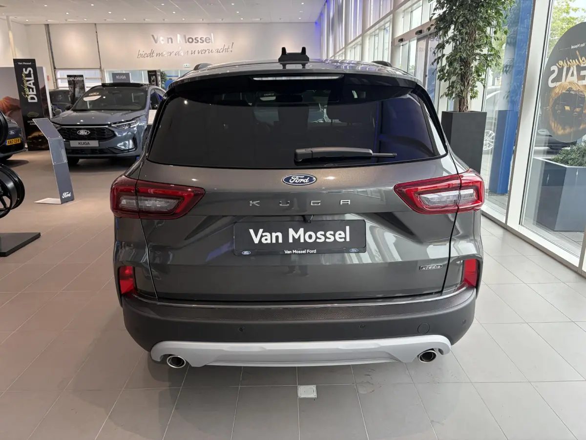 2.5 PHEV Titanium | WEGKLAPBARE TREKHAAK | VERWARMBARE VOORSTOELEN | VERWARMBAAR STUURWIEL | VERWARMBARE VOORRUIT | KEYLESS ENTRY | APPLE CAR PLAY | PARKEERSENSOREN | ACHTERUITRIJCAMERA | NA