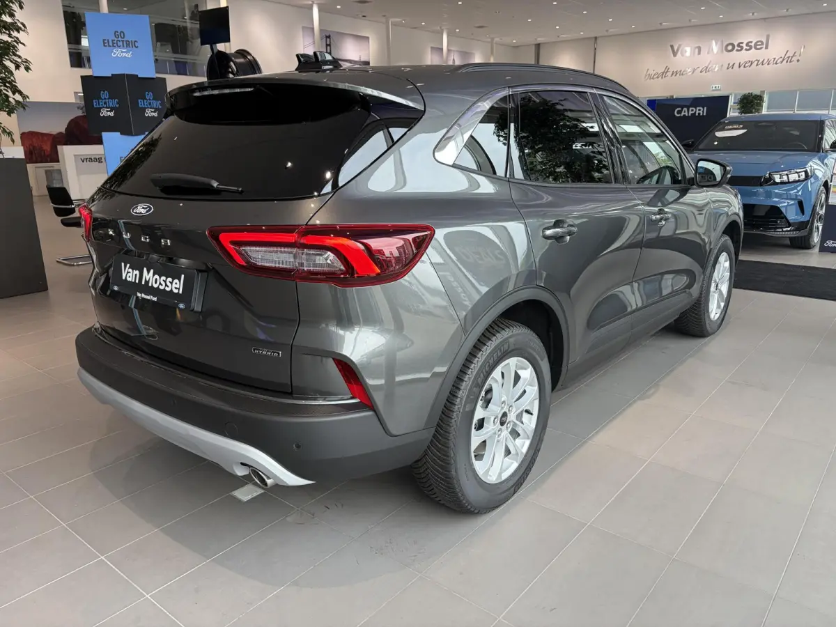 2.5 PHEV Titanium | WEGKLAPBARE TREKHAAK | VERWARMBARE VOORSTOELEN | VERWARMBAAR STUURWIEL | VERWARMBARE VOORRUIT | KEYLESS ENTRY | APPLE CAR PLAY | PARKEERSENSOREN | ACHTERUITRIJCAMERA | NA
