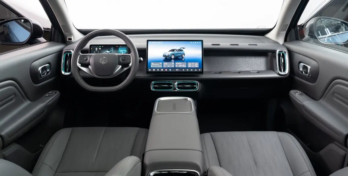 Design ProMax 67.1 kWh | €1500,- korting !! | Vanaf €499,- Private Lease per maand ! | Panoramadak | Carplay | Achteruitrijcamera | 18" Lichtmetalen Velgen | Adaptieve cruise control | P