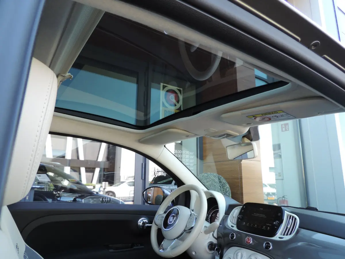 0.9 TwinAir Turbo Lounge 84.000km | Panodak | 15'' Lmvelgen | Cruise contr | PDC | CarPlay | Airco | Navi | Bluetooth