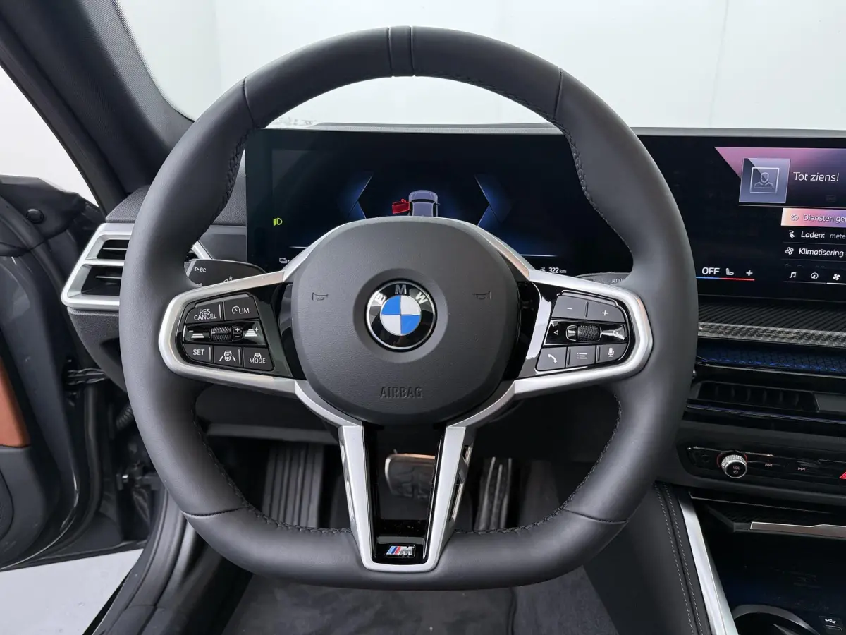 eDrive40 M Sport Edition 84 kWh | SoH 100% | Trekhaak | Driving Assistant Professional | Carbon inleg |