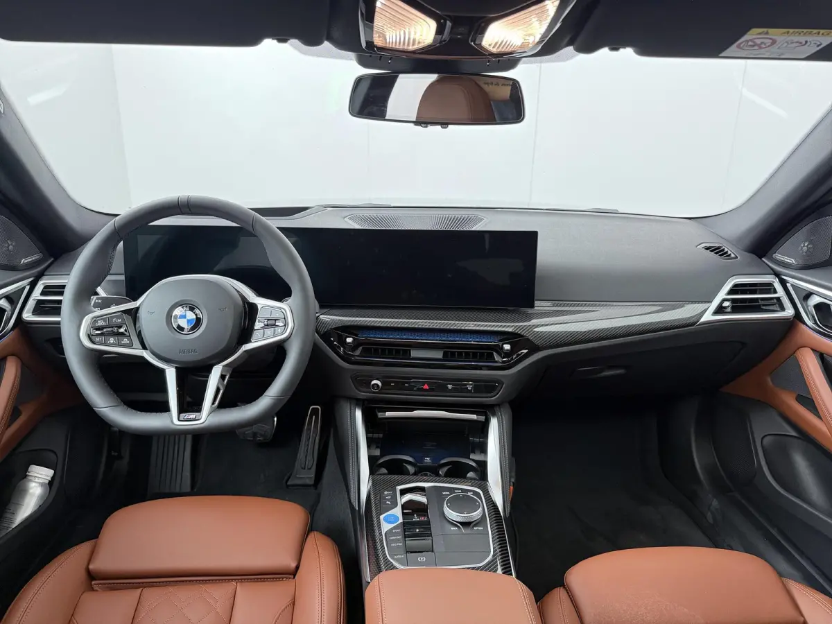 eDrive40 M Sport Edition 84 kWh | SoH 100% | Trekhaak | Driving Assistant Professional | Carbon inleg |