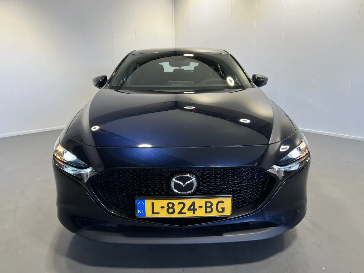 2.0 e-SkyActiv-X M Hybrid 186 | Navigatie/Android/Apple Carplay | LMV 16" | Cruise Control Adaptief | Airco | Dodehoekdetectie | LED Koplampen |