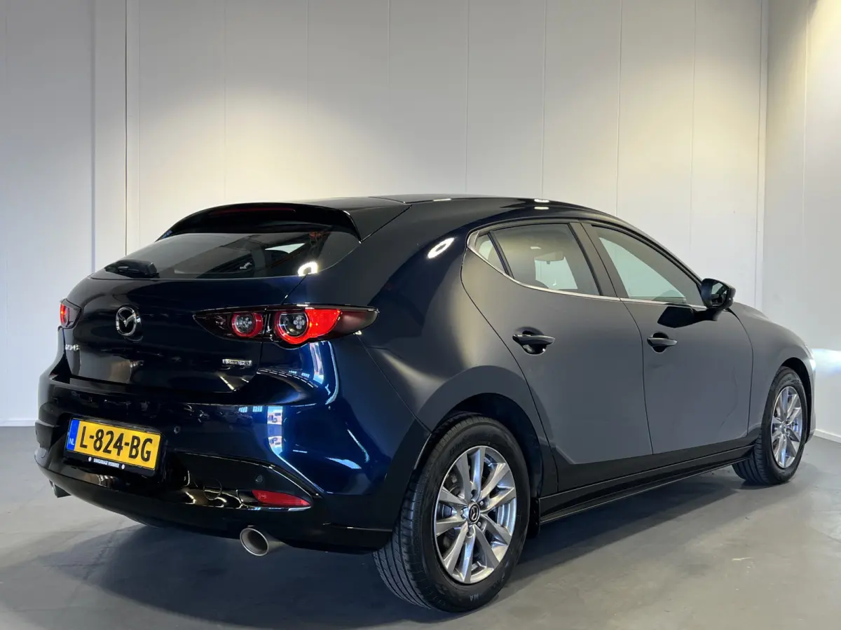 2.0 e-SkyActiv-X M Hybrid 186 | Navigatie/Android/Apple Carplay | LMV 16" | Cruise Control Adaptief | Airco | Dodehoekdetectie | LED Koplampen |