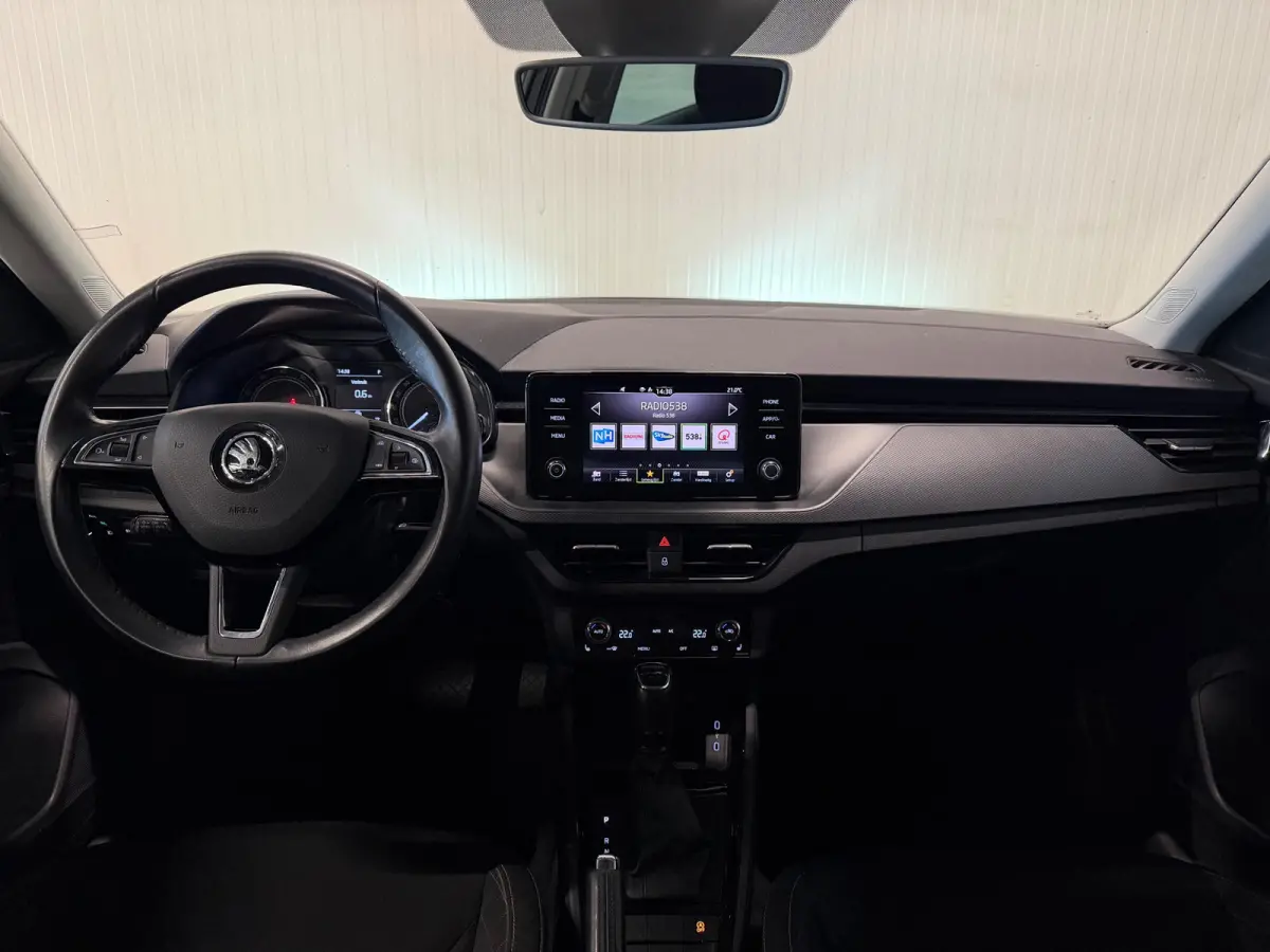 1.0 TSI Sport Business | ACC | CARPLAY | TREKHAAK | AUTOMAAT