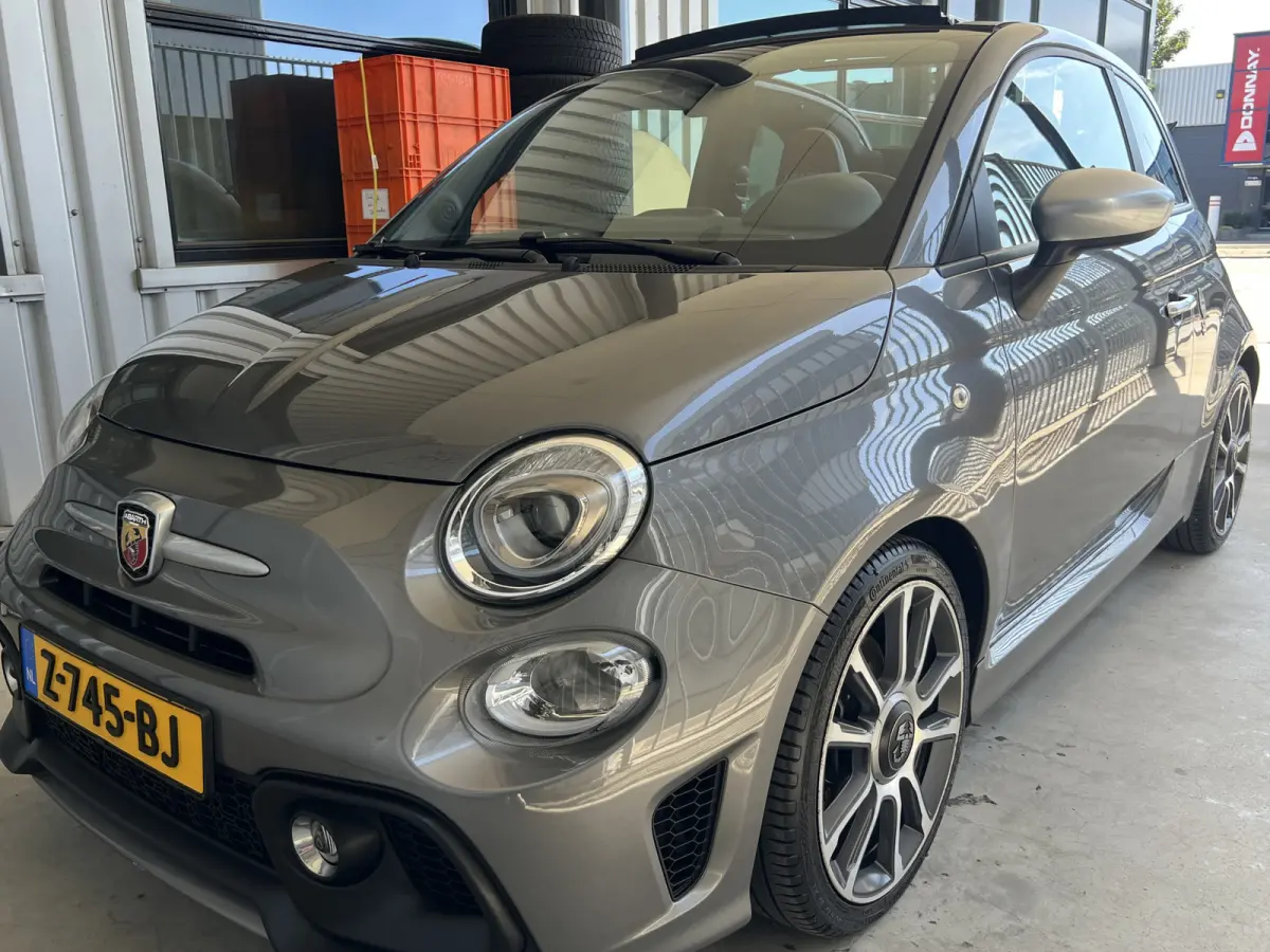 1.4 T-Jet Abarth Turismo Cabriolet 70th Anniversary I AUTOMAAT | LEDER I CARPLAY/ANDROID | NAVI | CLIMATE CONTROL | LMV 17'' | PDC | DAB | BLUETOOTH