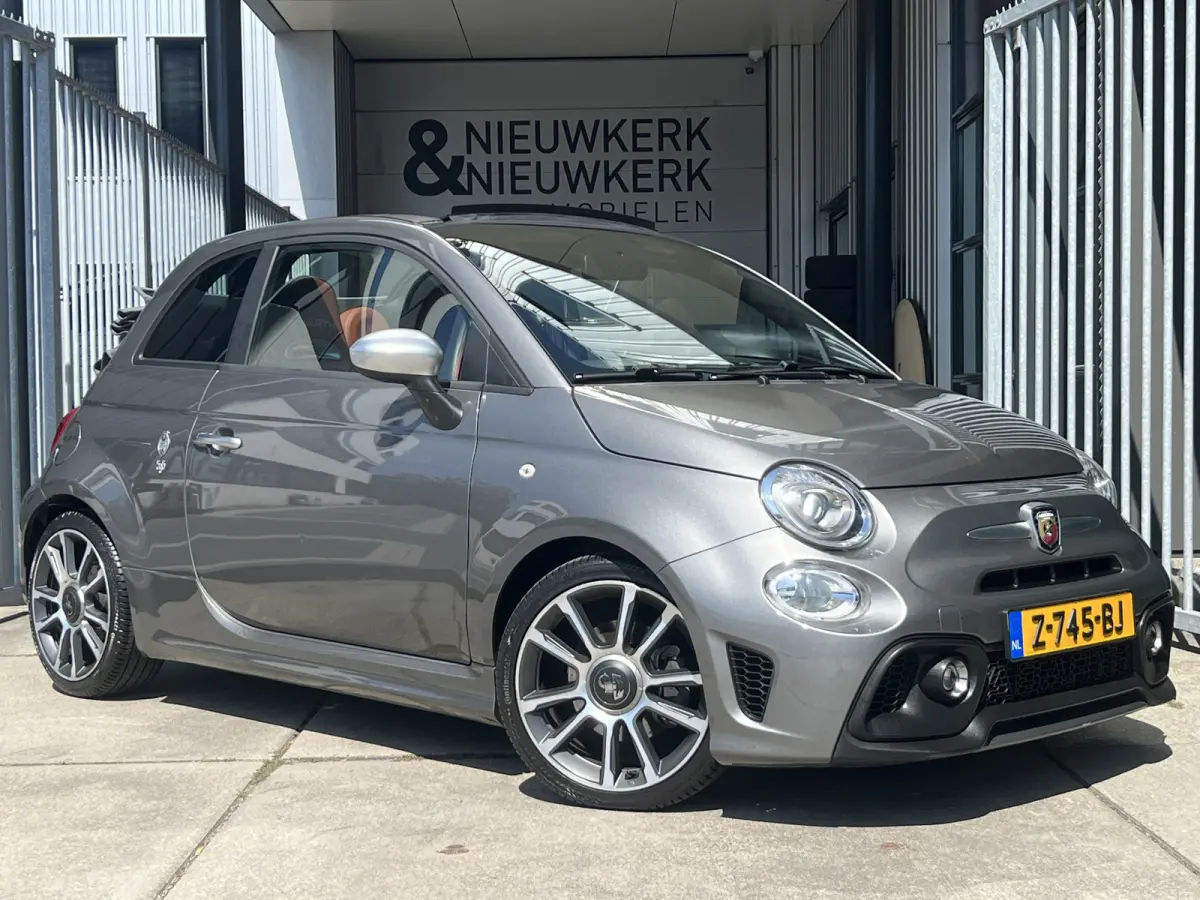 1.4 T-Jet Abarth Turismo Cabriolet 70th Anniversary I AUTOMAAT | LEDER I CARPLAY/ANDROID | NAVI | CLIMATE CONTROL | LMV 17'' | PDC | DAB | BLUETOOTH