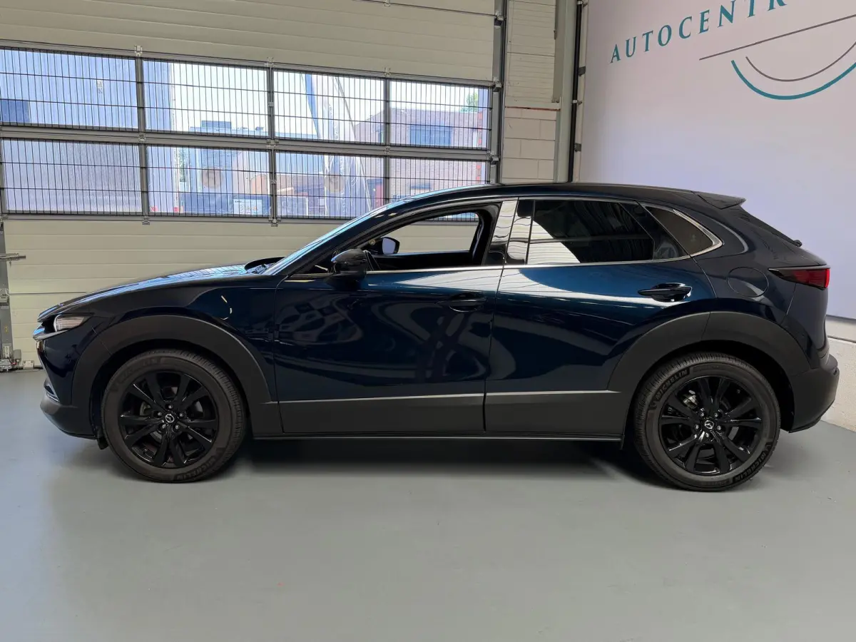 2.0 e-SkyActiv-X M Hybrid Sportive 1 jaar Bovag Garantie, head-upp display, stoelverwaming, Navi, Carplay