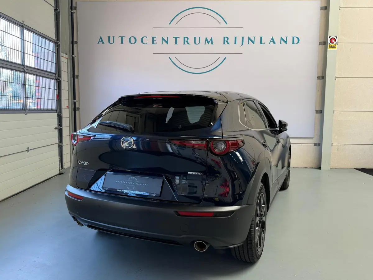 2.0 e-SkyActiv-X M Hybrid Sportive, head-upp display, stoelverwaming, Navi, Carplay
