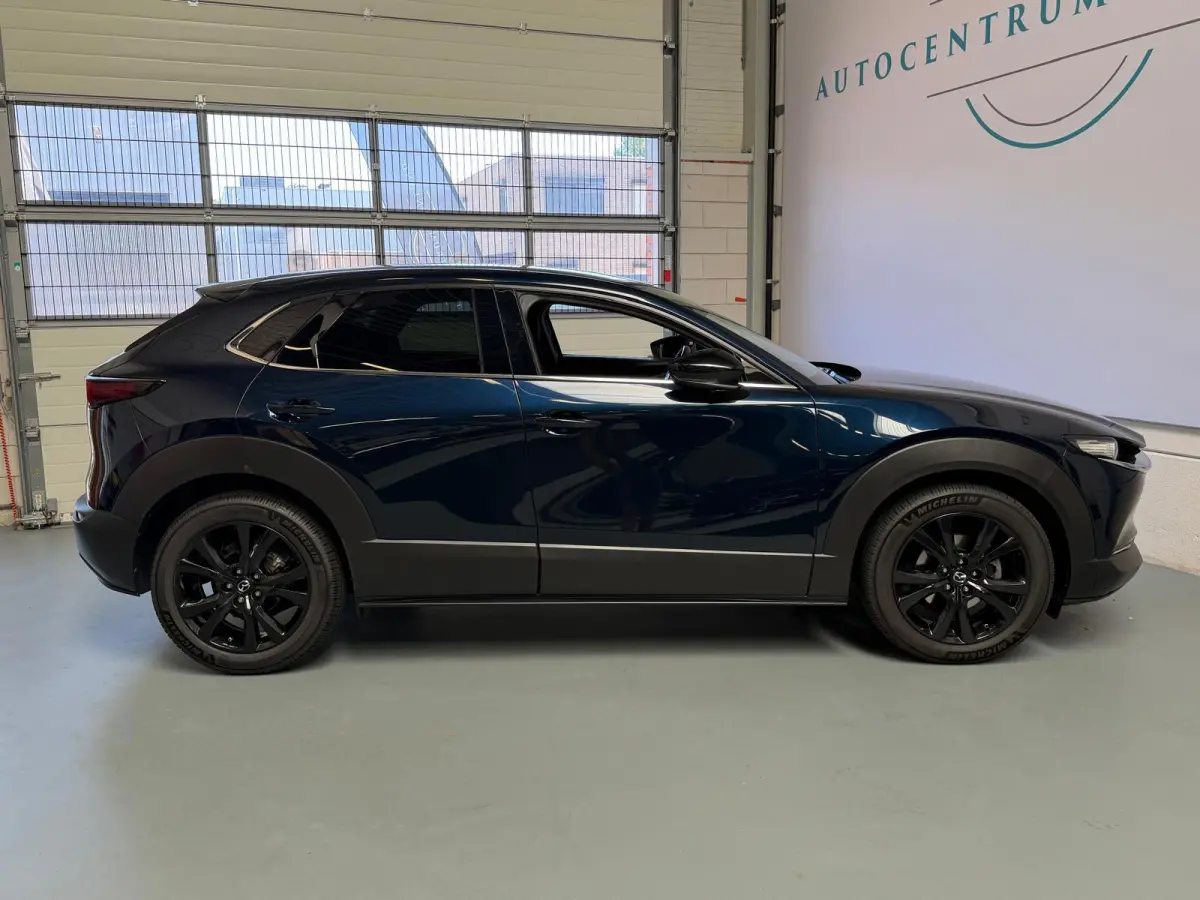 2.0 e-SkyActiv-X M Hybrid Sportive, head-upp display, stoelverwaming, Navi, Carplay