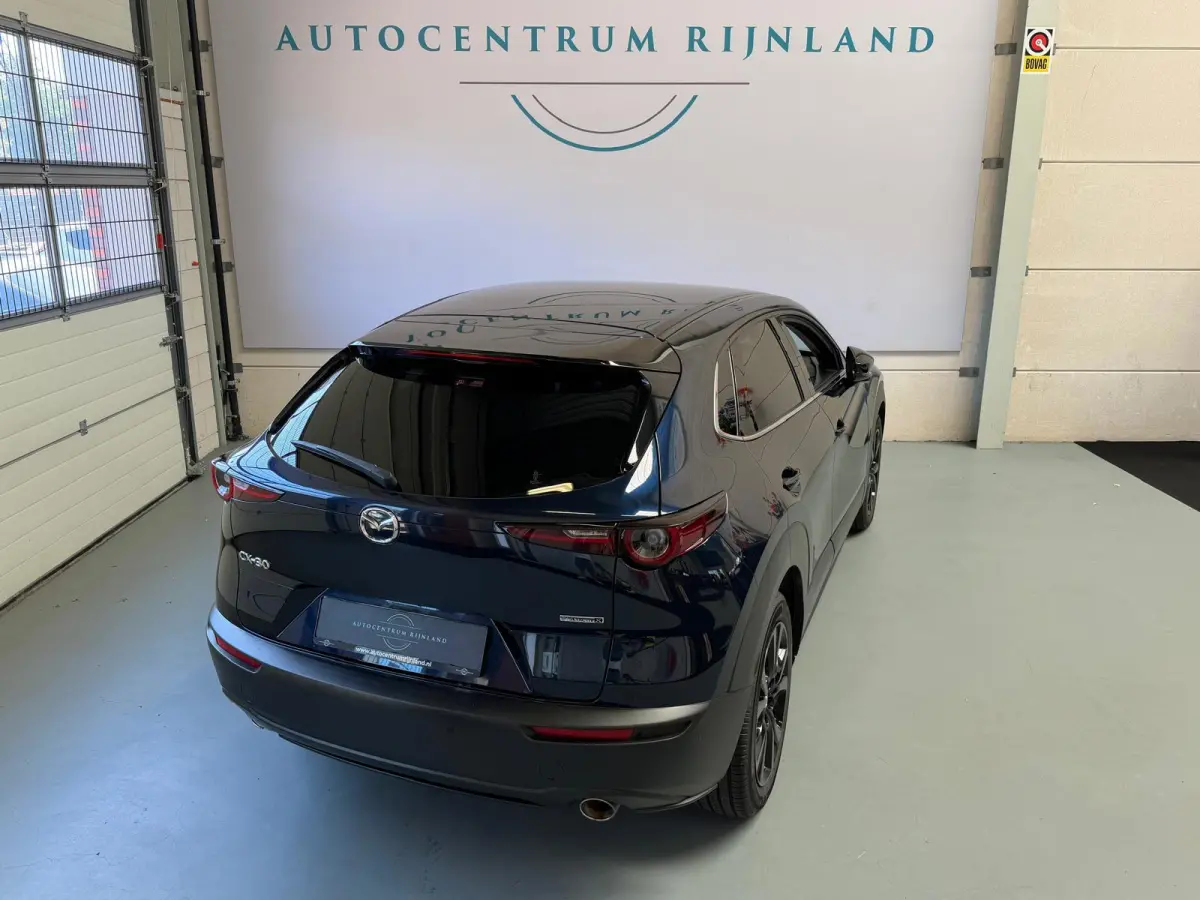 2.0 e-SkyActiv-X M Hybrid Sportive, head-upp display, stoelverwaming, Navi, Carplay