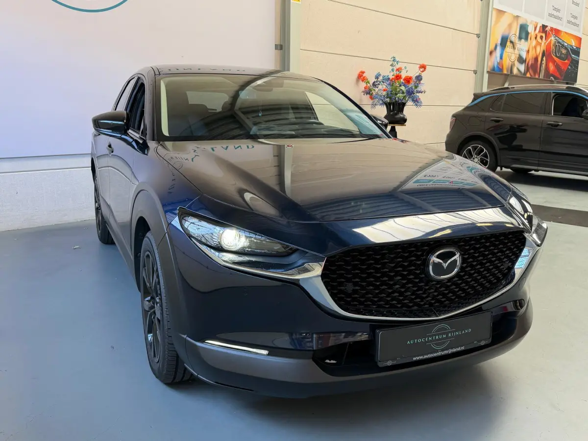 2.0 e-SkyActiv-X M Hybrid Sportive 1 jaar Bovag Garantie, head-upp display, stoelverwaming, Navi, Carplay