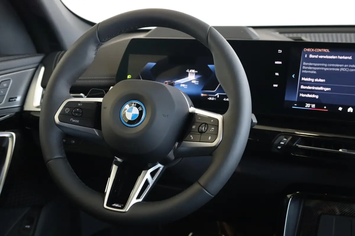 eDrive20 | M Sport Pro | Panoramadak | Driving Assistant Plus | Harman/Kardon | Head-Up Display | Trekhaak