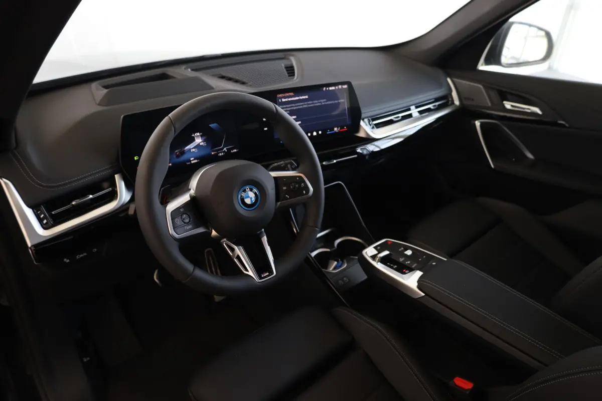 eDrive20 | M Sport Pro | Panoramadak | Driving Assistant Plus | Harman/Kardon | Head-Up Display | Trekhaak