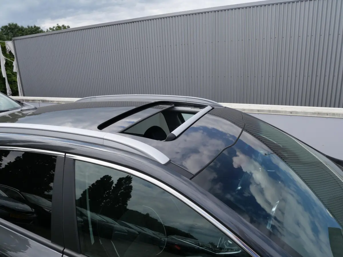 DynamicPlusLine 64 kWh | Cruise | Keyless | Navi | Schuif-kanteldak | Stoel-stuurverwarming |