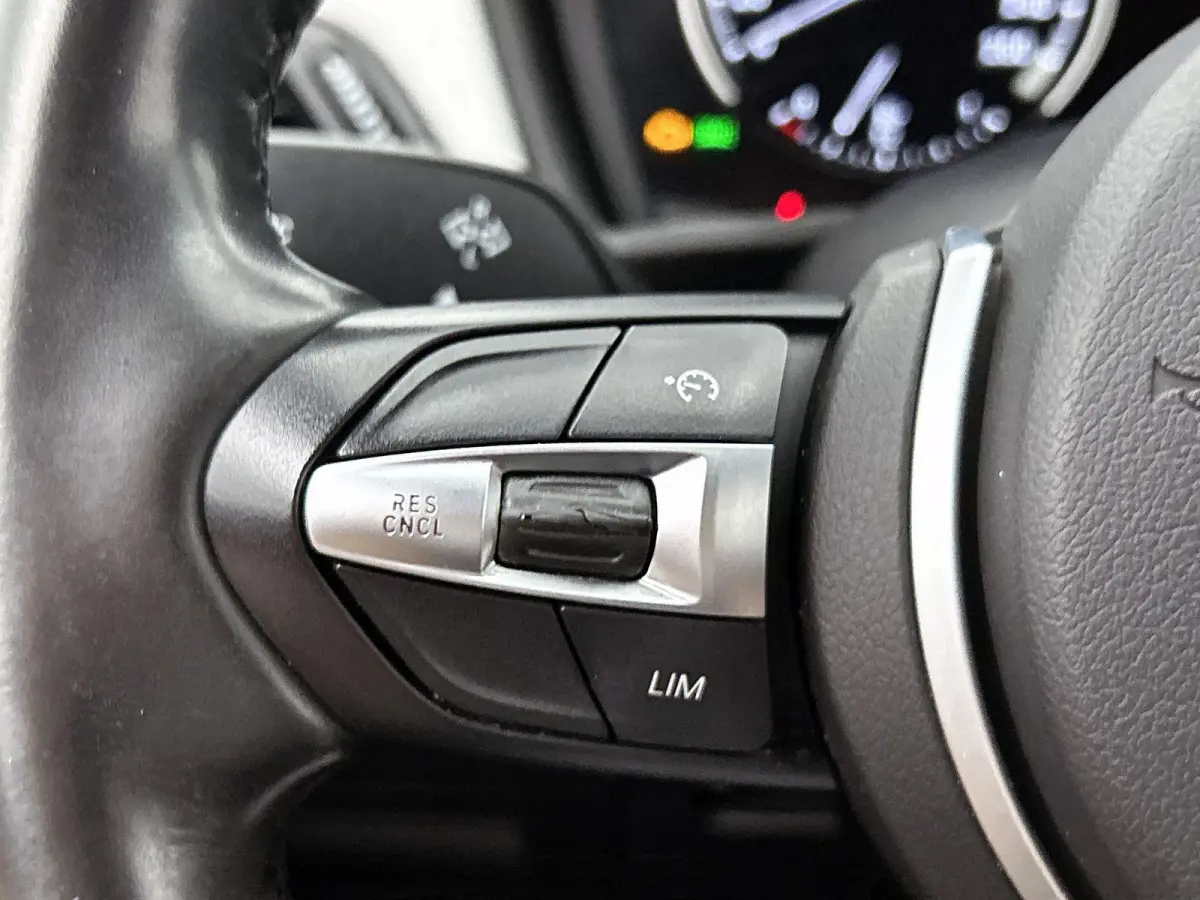 sDrive18i Executive Edition | M-SPORT | AUTOMAAT | HEAD-UP | CLIMATE CONTROL | CRUISE CONTROL | NAVIGATIE | ELEKTRISCHE KOFFERKLEP | TREKHAAK |