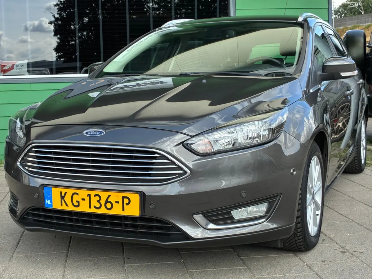 1.0 Titanium|2e Eigenaar|Navigatie|CruiseControl|Climatronic|PDC|Dealer Onderhouden|