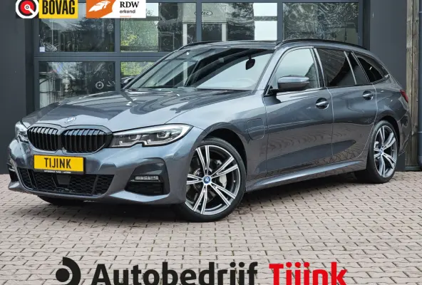 330e M-Sport Touring Plus | LED | Pano | Trekhaak | Stoelverwarming | Shadow-Line | Park Assist | Driving Assistant | Vol |