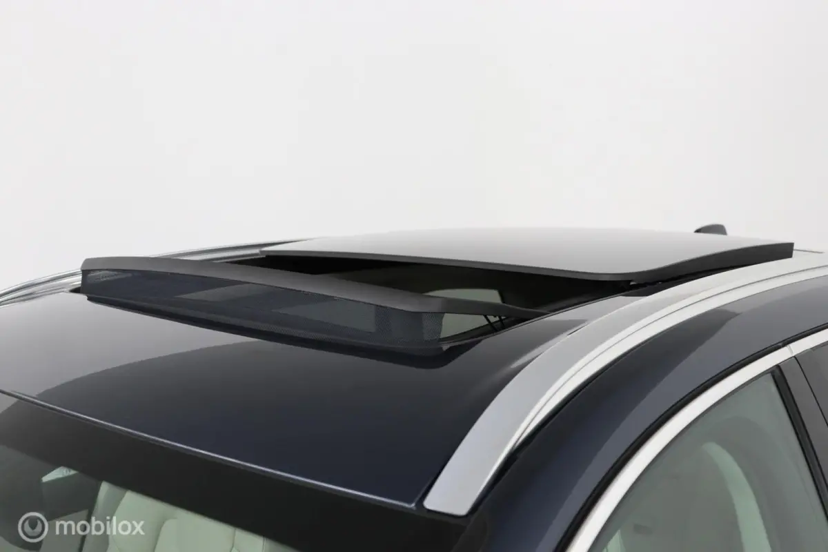 2.0 T6 AWD Momentum | Keyless | BLISS | Verwarmbare stoelen & Stuurwiel | Harman Kardon | Camera