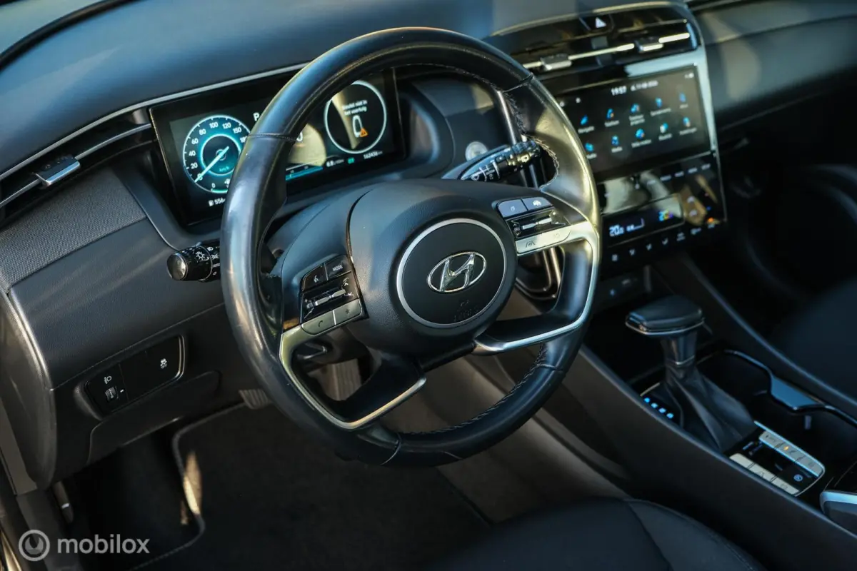 1.6 T-GDI MHEV Comfort Smart | Pano | Stoelverwarming | Trekhaak | 18 Inch | Carplay | LED | Camera | All seasons