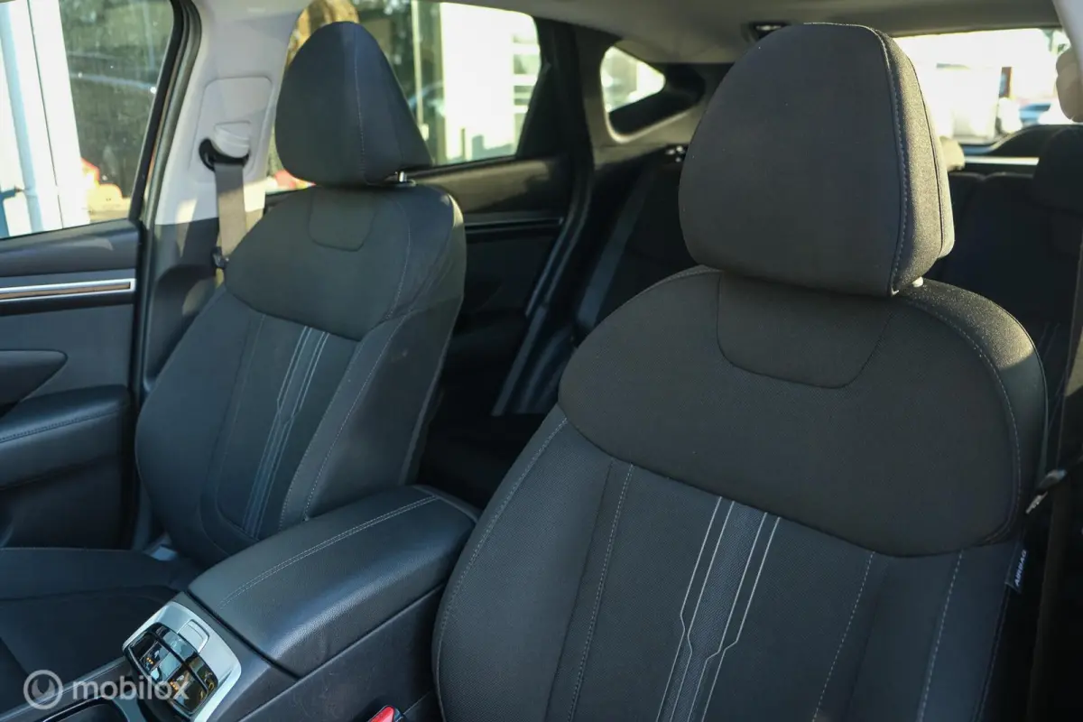 1.6 T-GDI MHEV Comfort Smart | Pano | Stoelverwarming | Trekhaak | 18 Inch | Carplay | LED | Camera | All seasons