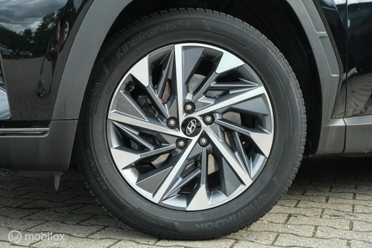 1.6 T-GDI MHEV Comfort Smart | Pano | Stoelverwarming | Trekhaak | 18 Inch | Carplay | LED | Camera | All seasons