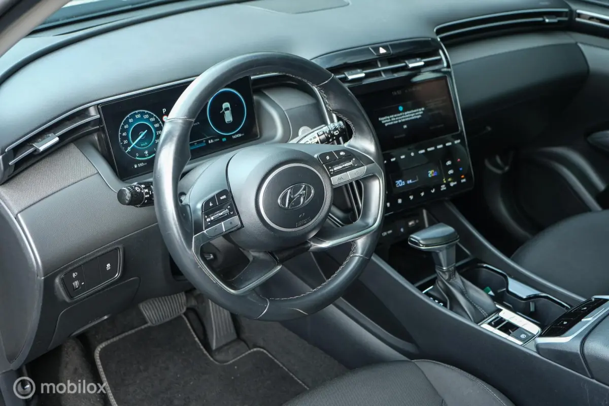 1.6 T-GDI MHEV Comfort Smart | Pano | Stoelverwarming | Trekhaak | 18 Inch | Carplay | LED | Camera | All seasons