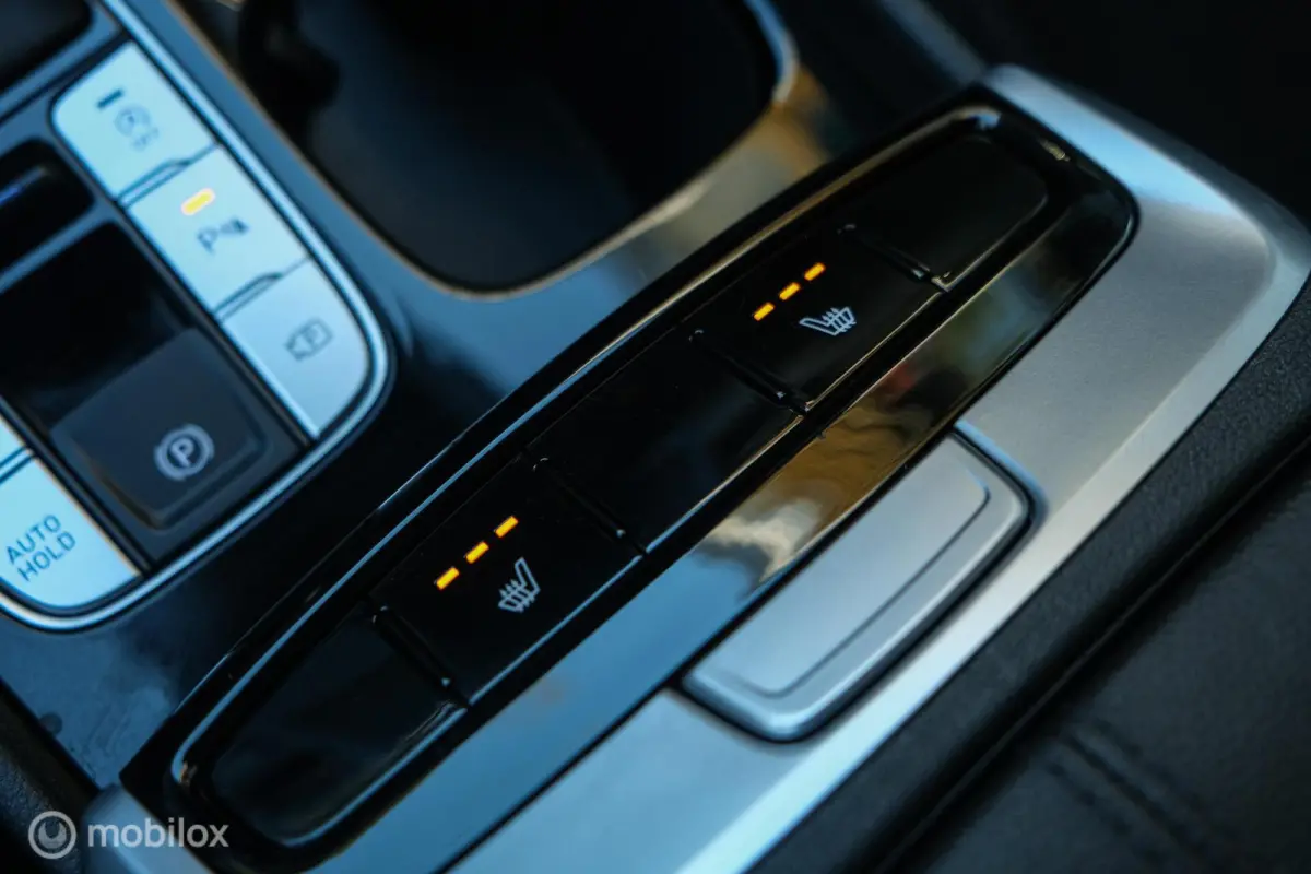 1.6 T-GDI MHEV Comfort Smart | Pano | Stoelverwarming | Trekhaak | 18 Inch | Carplay | LED | Camera | All seasons