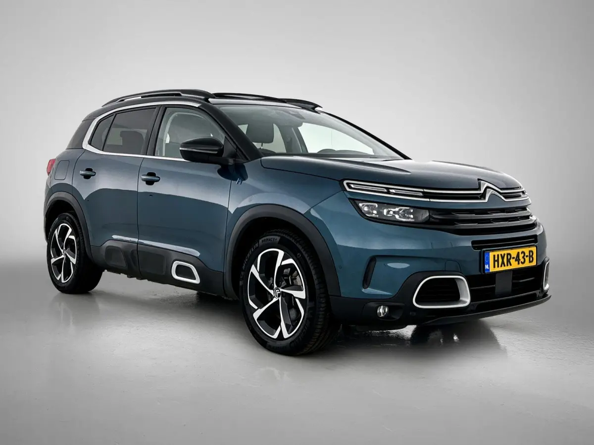 SUV Feel 1.6 Plug-in HYbrid 225pk Automaat | Navigatie | Panoramisch schuif-kanteldak | Achteruitrijcamera | Climate Control | Adaptieve Cruise Control | Parkeersensoren v+a | Comfortstoelen
