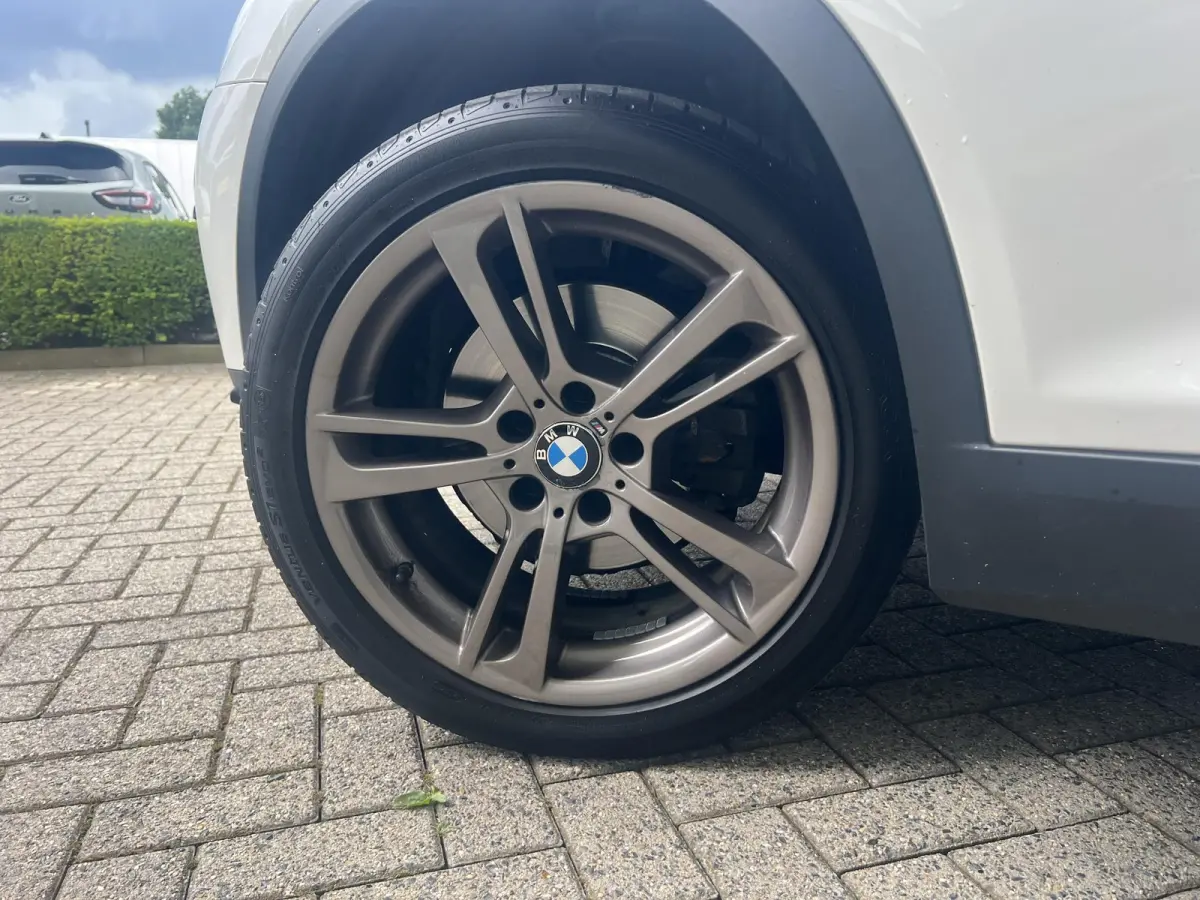 xDrive28i Centennial High Executive | Head-up | Panoramadak | Camera voor+achter | Elek. Achterklep | Bi-Xenon | Flippers | Stoelverwarming | Elek. Stoelen met Memory voor bestuurder