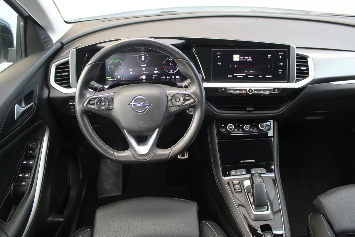 1.6 Turbo Plug-In Hybrid Business Elegance | Afn Trekhaak | Camera | Stoelverw. & Vert | Carplay | Adapt Cruise | Dodehoeksens. | Navi | LED | Afn Trekhaak | Camera | Stoelverw. & Vert | Car