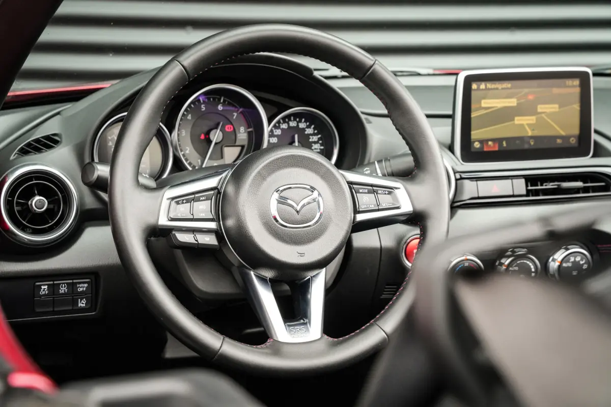 2.0 SkyActiv-G 160 GT-M | BOSE | CRUISE | NAVI | LEDER | STOELVERW. | PDC | SOUL RED | SPORTUITLAAT |