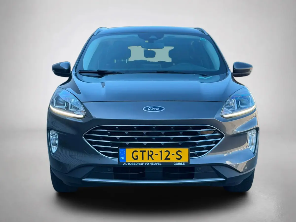 2.5 PHEV Titanium(Goed OnderH, Navi, Parkeersensor V+A, Cruise Con, Digitale Dash, Etc)