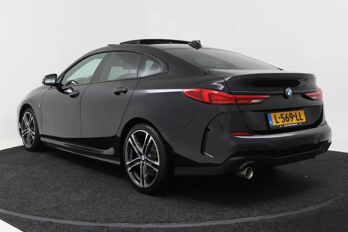 218i Business Edition Plus (PANORAMADAK, CAMERA, SFEERVERLICHTING, STOELVERWARMING, PARKEE