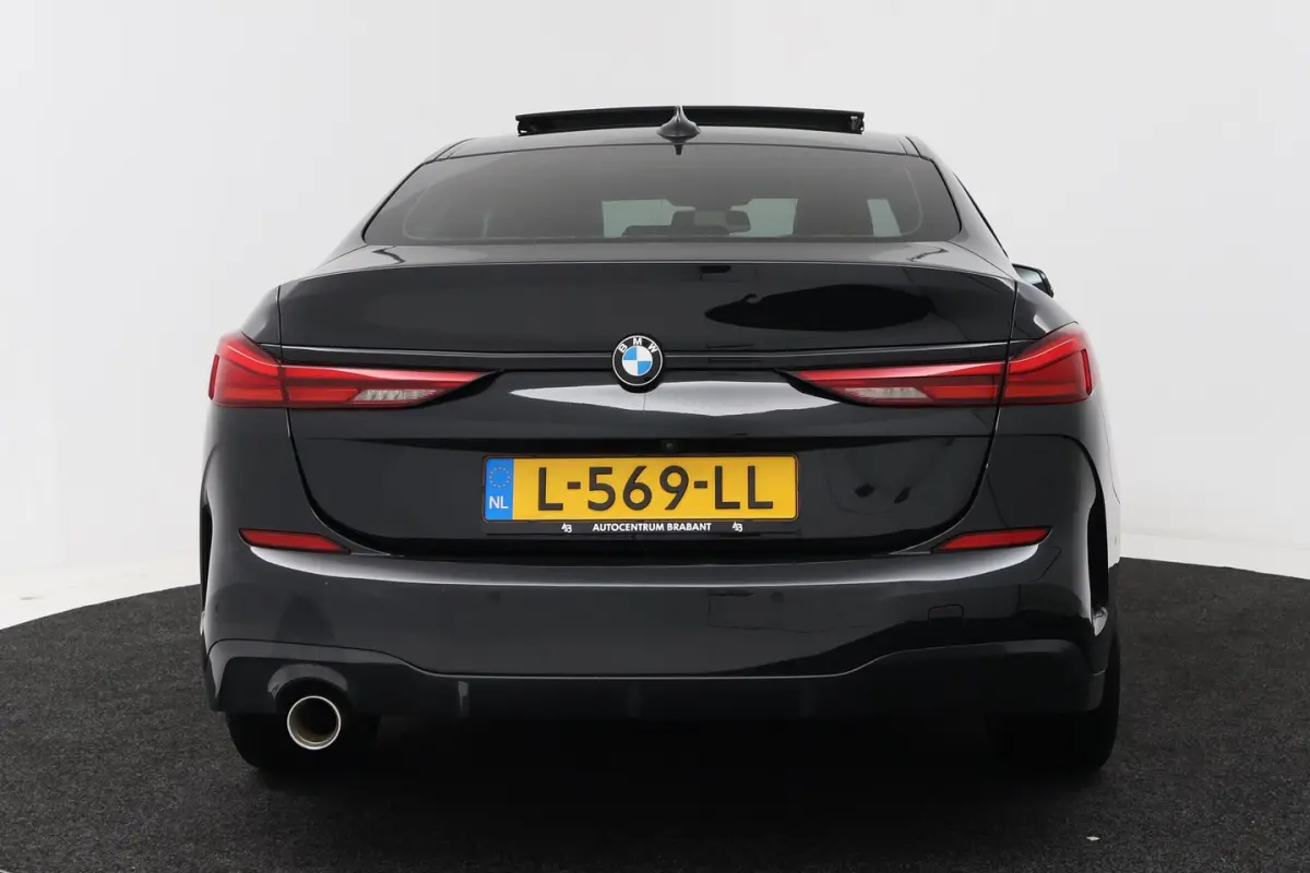 218i Business Edition Plus (PANORAMADAK, CAMERA, SFEERVERLICHTING, STOELVERWARMING, PARKEE