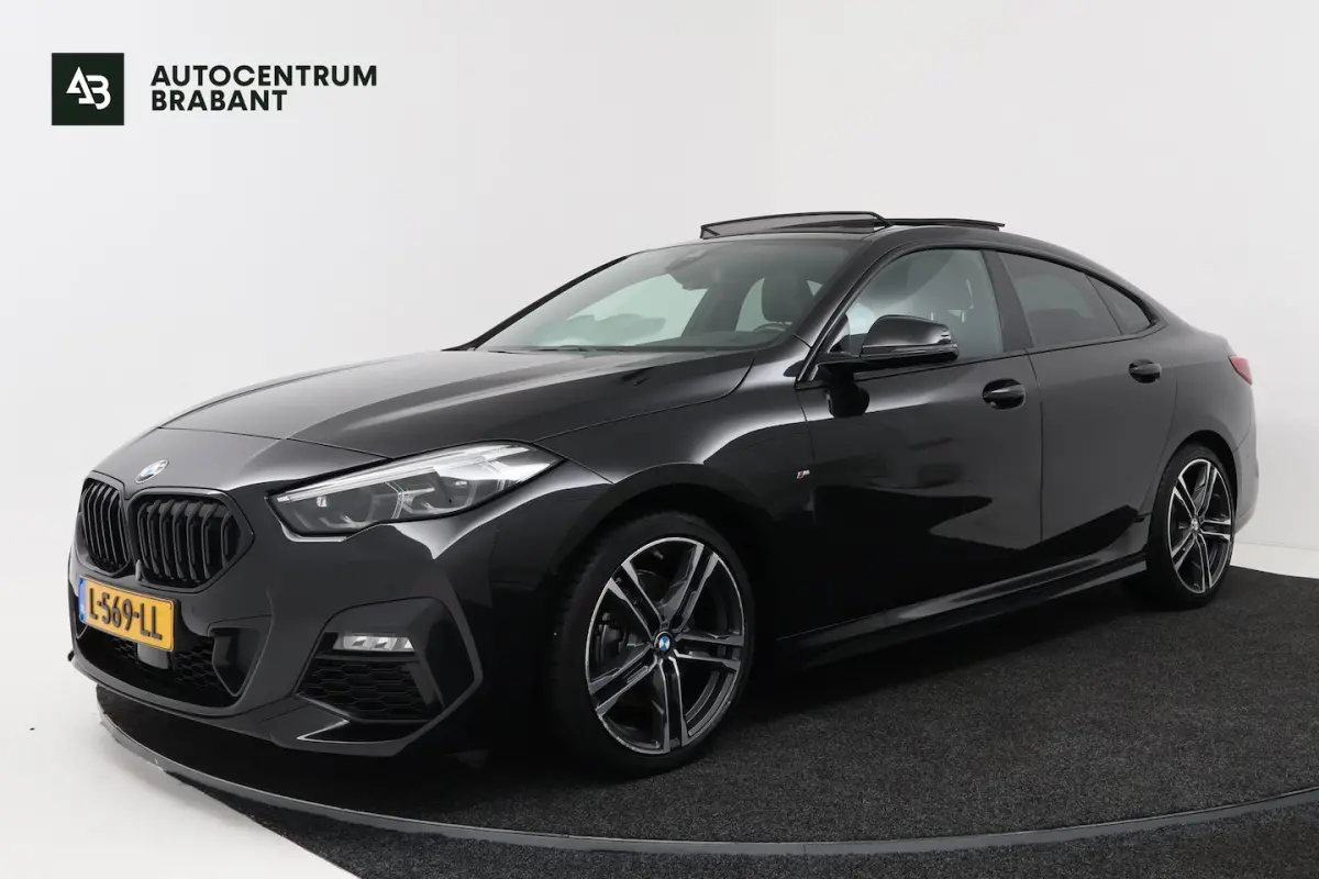 218i Business Edition Plus (PANORAMADAK, CAMERA, SFEERVERLICHTING, STOELVERWARMING, PARKEE