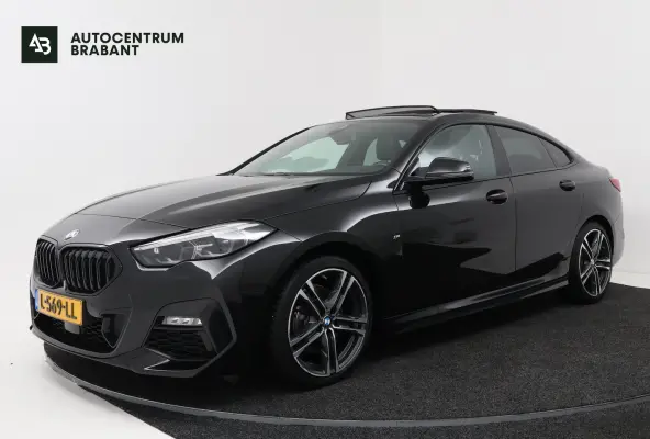 218i Business Edition Plus (PANORAMADAK, CAMERA, SFEERVERLICHTING, STOELVERWARMING, PARKEE