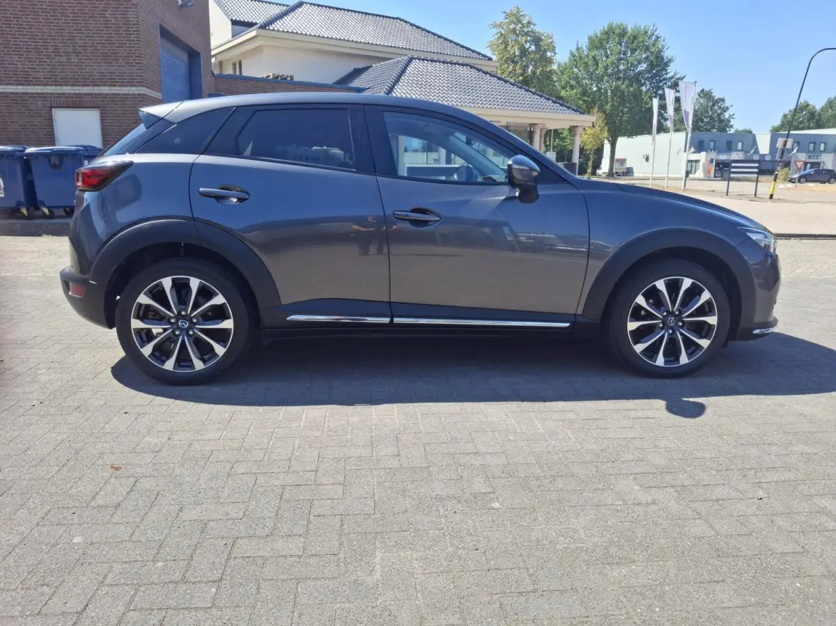 2.0 SkyActiv-G 121 Sport Selected