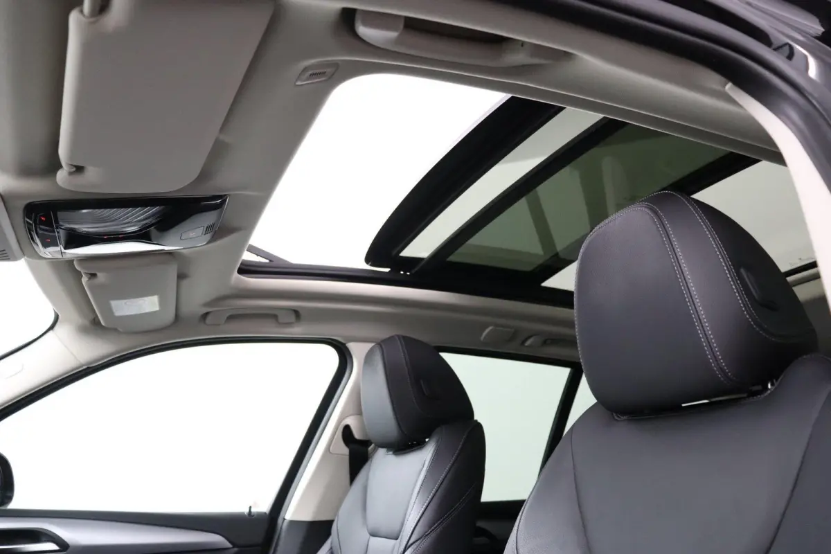 xDrive20d High Executive | Trekhaak | Schuif/kanteldak