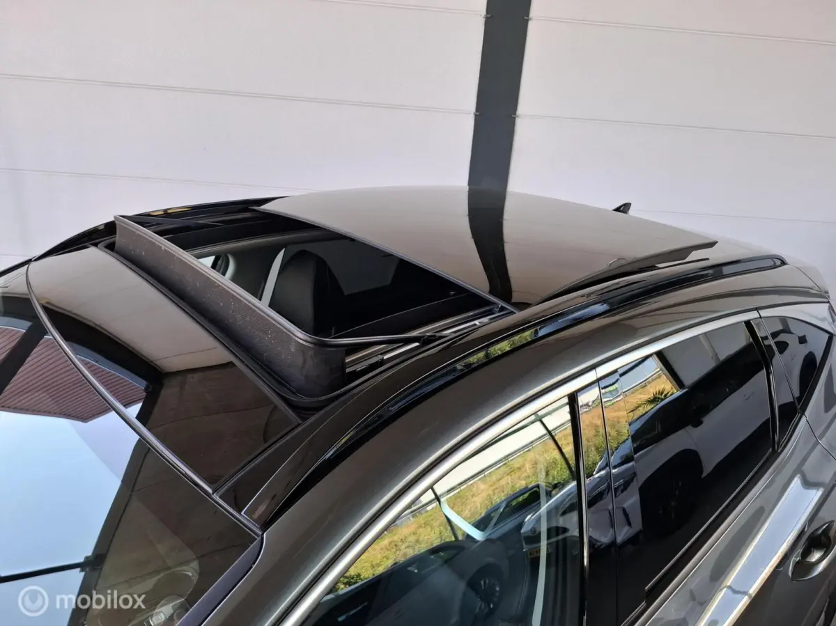 1.6 T-GDI MHEV Premium Sky