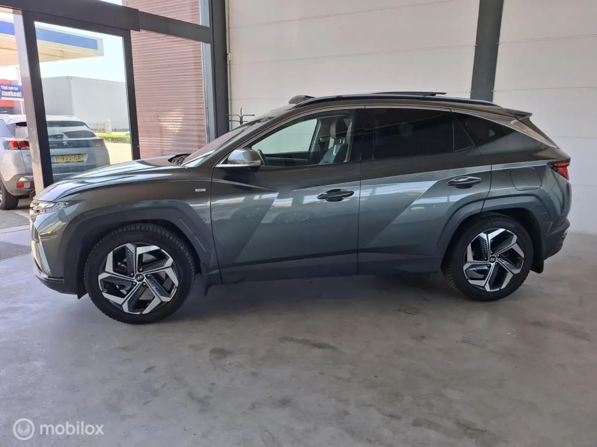 1.6 T-GDI MHEV Premium Sky