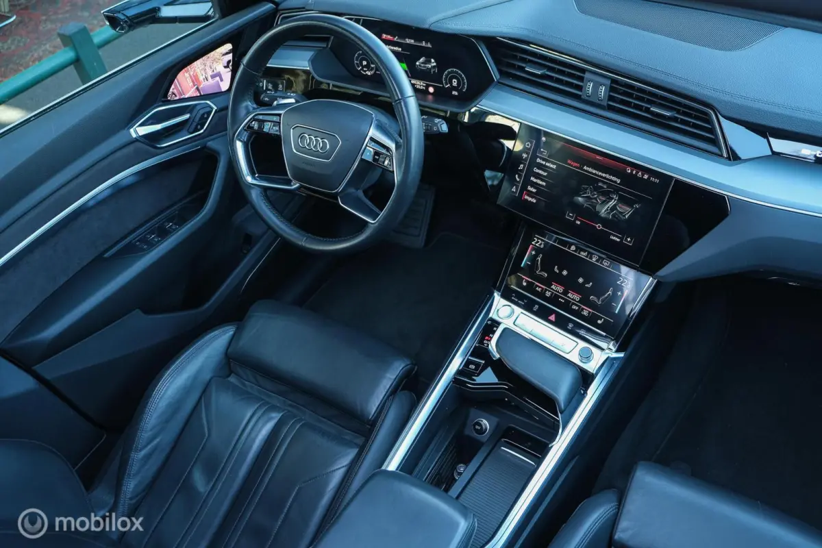 55 quattro Business edition Plus 95 kWh | Pano | ACC | HUD | B&O | Luchtvering | Stoelverwarming voor en achter | Trekhaak | Ambient | 360 | Clima achterin | Galaxisblauw metallic