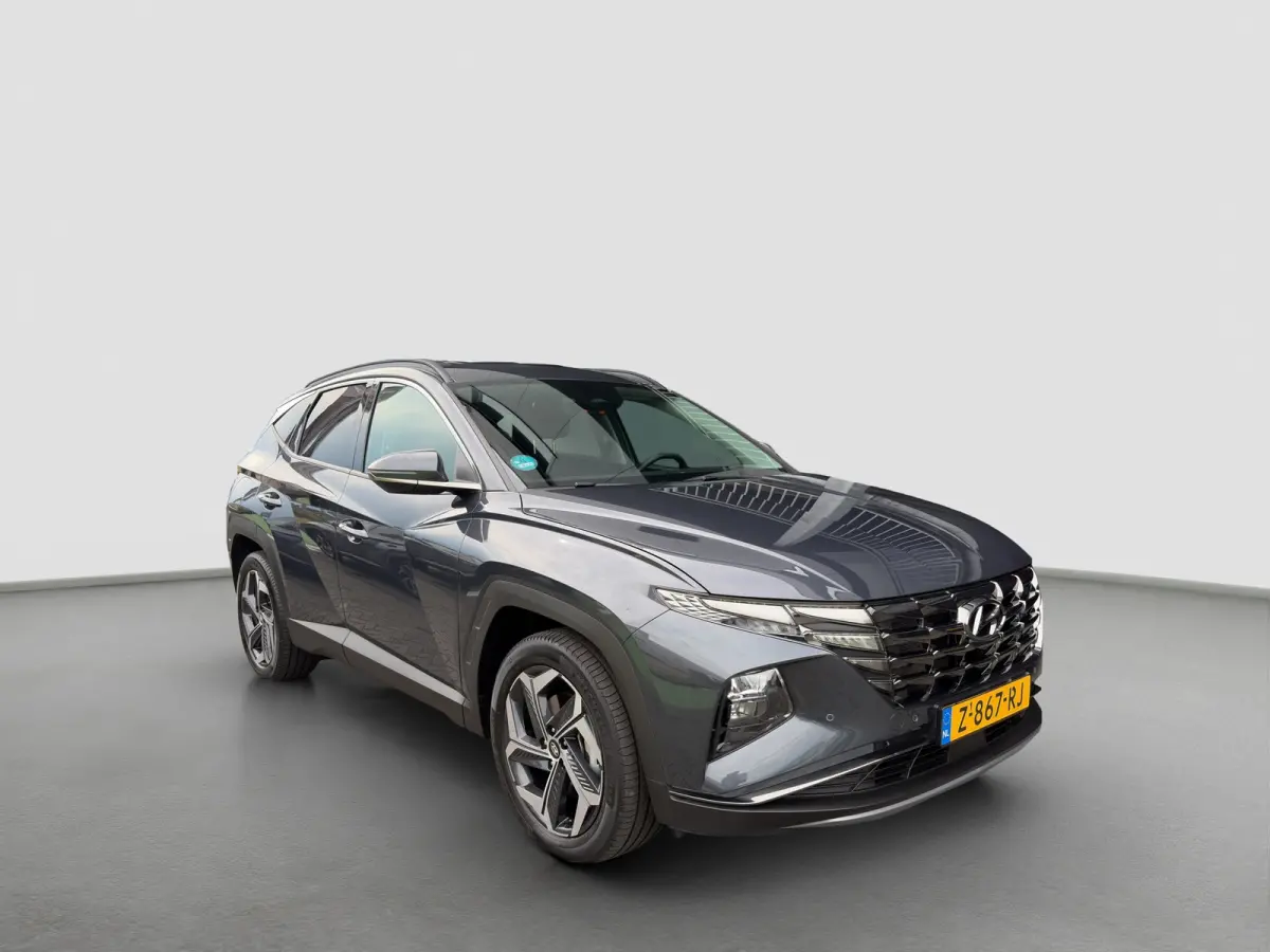 1.6 T-GDI PHEV 265pk Comfort 4WD | Carplay | Climate Control | 19-inch velgen | Adaptive Cruise | Camera | DAB | Draadloze telefoonlader | Parkeersensoren | Metallic lak
