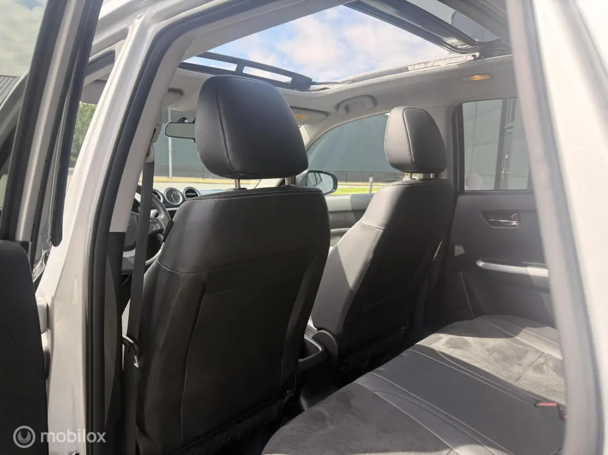 1.6 High Executive | Pano schuifdak | Trekhaak | Half Leder | Zeer compleet